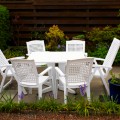 Image of table and six chairs in the garden of Cosaig self catering, holiday cottage, Innerleithen, Scottish Borders